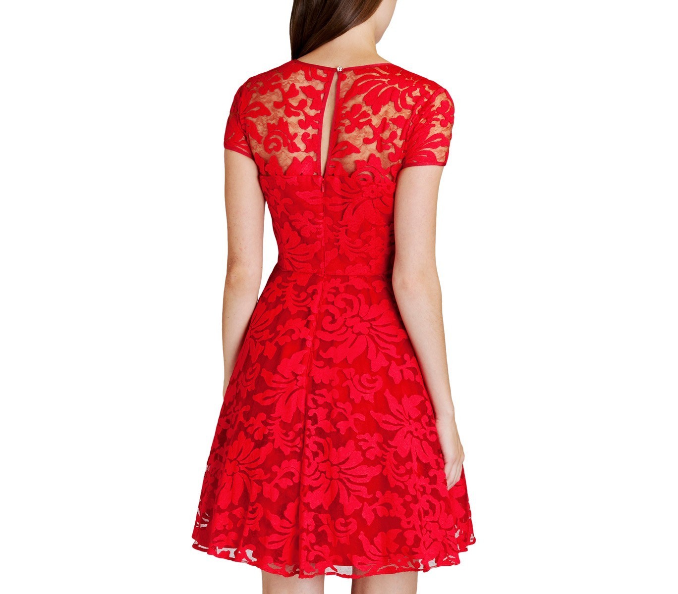 Robe dentelle manches courtes mod Cecille bouton sur le dos. Légèrement évasée
