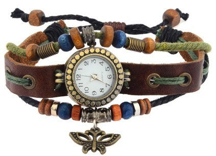 Montre analogique vintage avec papillon à la mode forme ronde