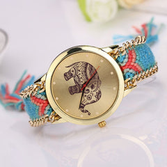 Montre ethnique/ dessin éléphant / Face et bords dorés MOD SUMMER