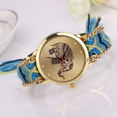 Montre ethnique/ dessin éléphant / Face et bords dorés MOD SUMMER