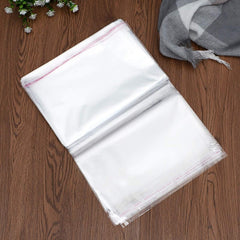 100 sachets plastiques transparents cellophane fermeture adhésive 30x44cm