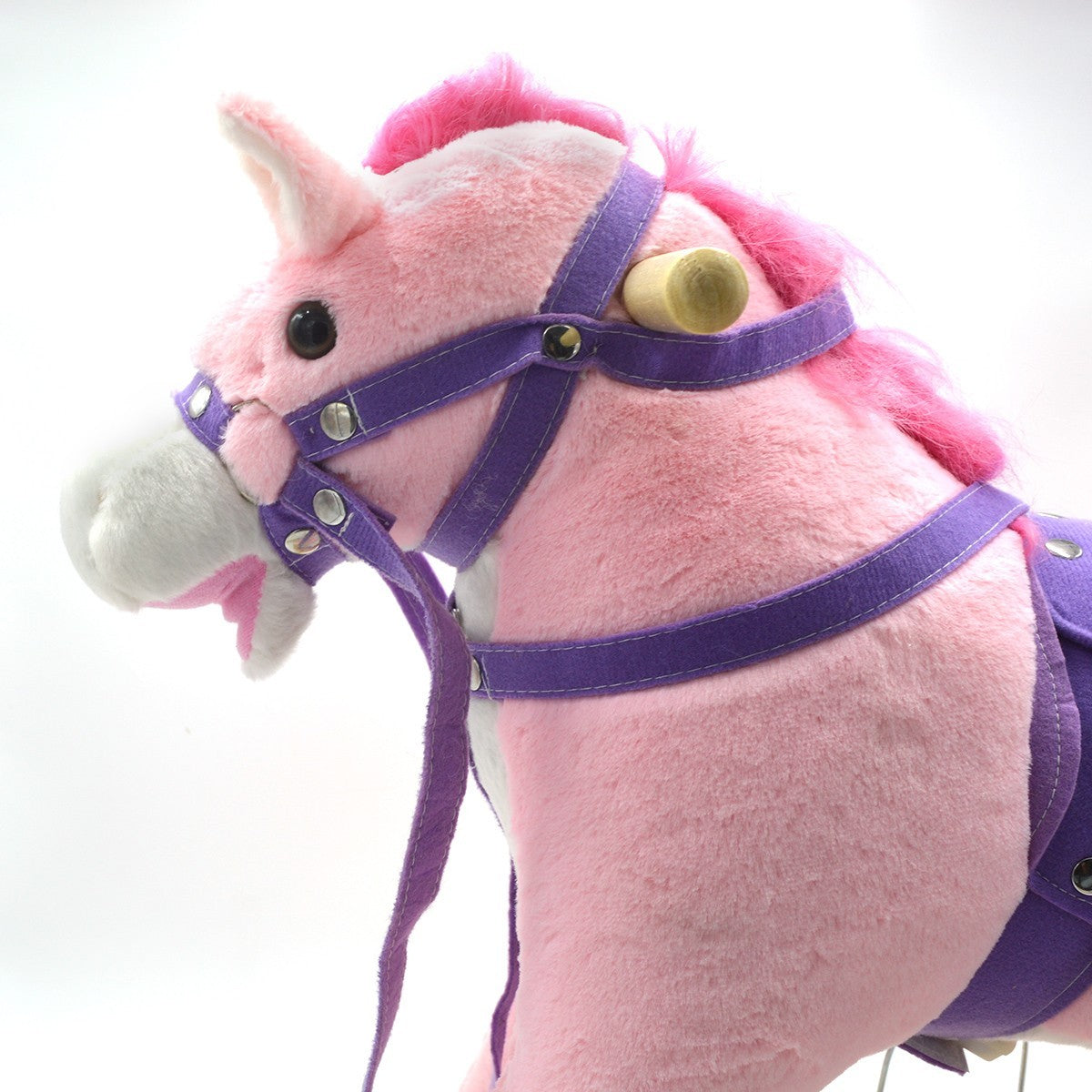 Cheval à bascule en peluche et bois 432013 bouge la bouche et fait le vers ROSE