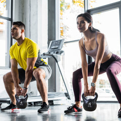 Kettlebell fitness 4kg en pvc 186946 avec sable et poignée anti-frottement