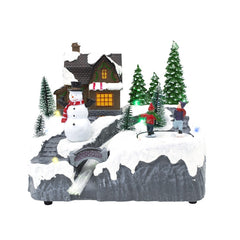 Scène de Noël enneigée carrousel musique lumières mouvement ruisseau