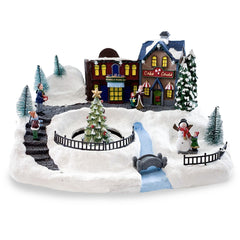 Village de Noel enneigé Carrousel Lumières Sons Mouvement 37x21x27cm