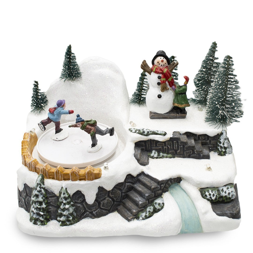 361004 Carrousel village Noël avec piste lumineuse mouvement musical 18x13x16cm