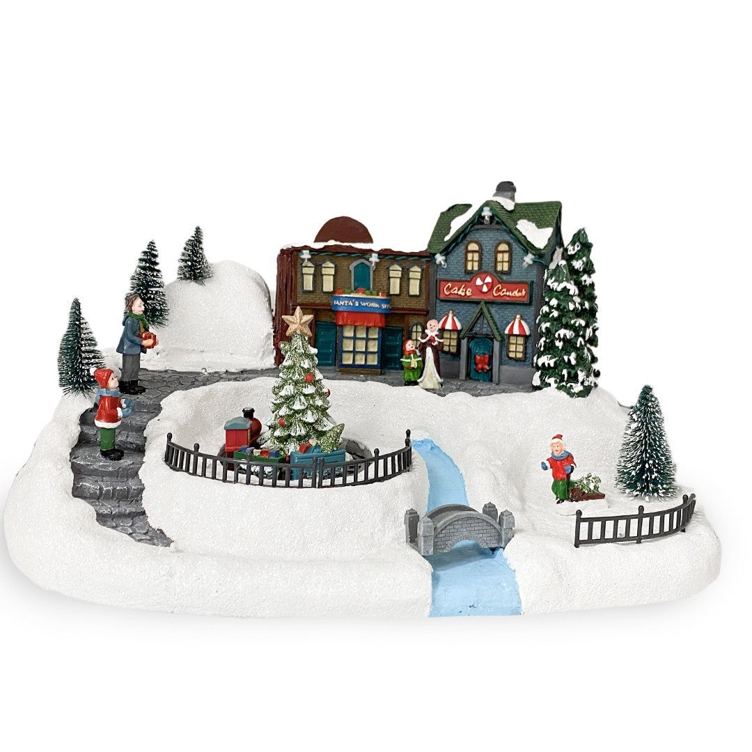 361039 Carousel Christmas Village Snow, Lights, Sounds and Movement 37x21x27