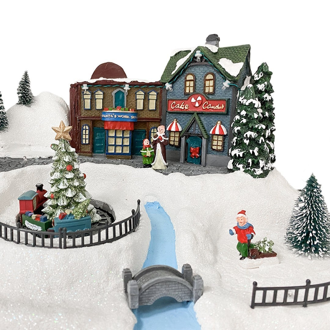 361039 Carousel Christmas Village Snow, Lights, Sounds and Movement 37x21x27
