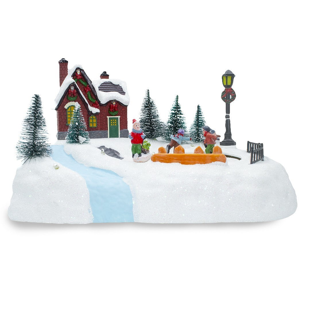 361040 Carrousel de Noël patinoire avec lumières, sons et mouvements 20x20x16 cm