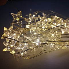 561081 Guirlande 50 LED LIGHT CHRISTMAS INSIDE sous forme d'étoiles à piles
