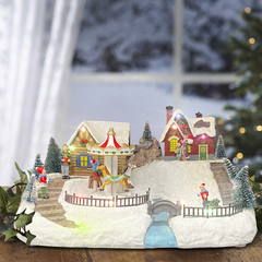 Village carrousel de Noël 38x27x24 cm 361062 avec lumières, musique et mouvement