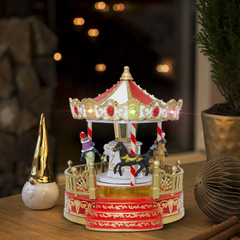 Carrousel de Noël 361045 avec lumières, sons et mouvement 18x18x20 cm